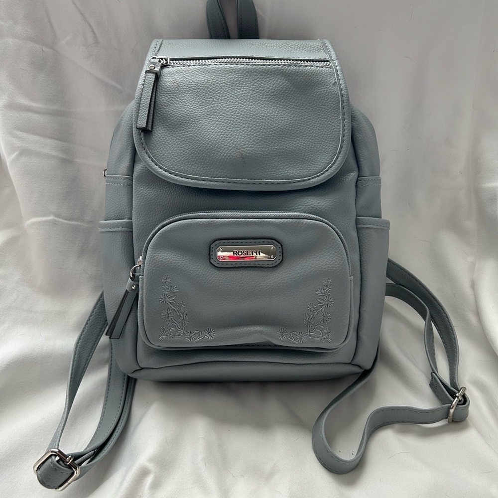 Rosetti Pale Gray Faux Leather Backpack with Silver Plaque